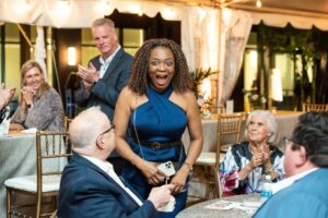 Flora Bartek reacts to hearing her name as the winner of the Zachary’s Jewelers jewelry prize at Hospice of the Chesapeake's 45th Anniversary Celebration held May 11 at the Fluegel Alumni Center in Annapolis.