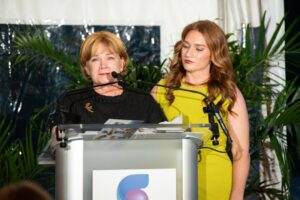 Jeanne Morris, left, shares her husband’s experience with Chesapeake Supportive Care and Hospice of the Chesapeake as her daughter Bridget Stockdale stands beside her at Hospice of the Chesapeake's 45th Anniversary Celebration held May 11 at the Fluegel Alumni Center in Annapolis.